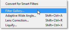 Selecting the Filter Gallery from the Filter menu in Photoshop CS6. Image © 2013 Photoshop Essentials.com