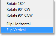 Choosing the Flip Vertical command in Photoshop CS6. Image © 2013 Photoshop Essentials.com