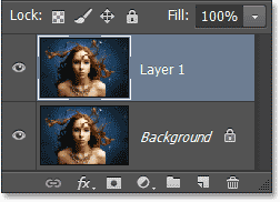 Layer 1 muncul di Layers panel di atas layer Background. Image © 2013 Photoshop Essentials.com