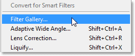 Selecting the Filter Gallery from the Filter menu in Photoshop CS6. Image © 2013 Photoshop Essentials.com