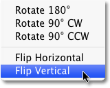 Selecting the Flip Vertical command in Photoshop. Image © 2010 Photoshop Essentials.com.