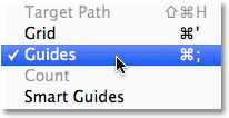 Mematikan panduan dengan pergi ke View menu, memilih Show, kemudian memilih Guides. Gambar © 2011 Photoshop Essentials.com.