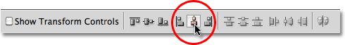 Align Horizontal Center pilihan di Options Bar. Image © 2010 Photoshop Essentials.com.
