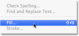 Memilih perintah Fill dari bawah menu Edit. Image © 2010 Photoshop Essentials.com.