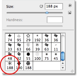 Selecting the first snowflake brush in Photoshop. Image © 2010 Photoshop Essentials.com.