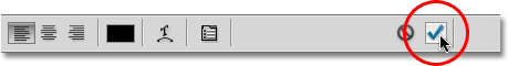 Clicking the checkmark to accept the text. Image © 2010 Photoshop Essentials.com.