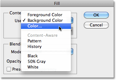 Changing the Use option to Color in the Fill dialog box in Photoshop. Image © 2010 Photoshop Essentials.com.