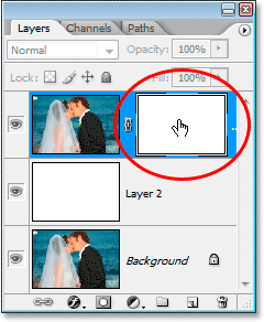 Selecting the layer mask in the Layers palette.