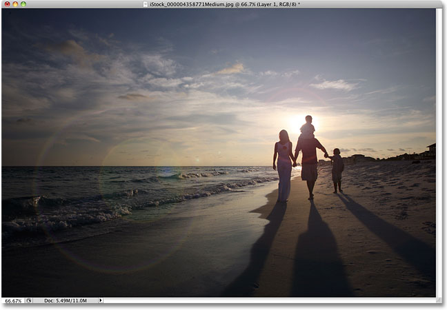 A more subtle lens flare effect in Photoshop. Image © 2010 Photoshop Essentials.com.