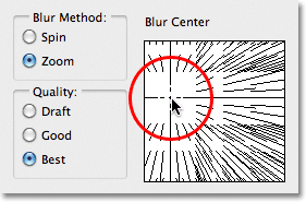 Dragging the blur center option in the Radial Blur dialog box. Image © 2011 Photoshop Essentials.com.