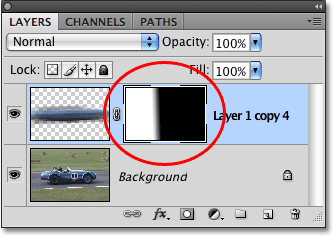 The gradient appears in the layer mask thumbnail in the Layers palette. Image © 2009 Photoshop Essentials.com.