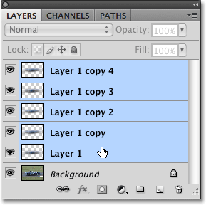 Selecting multiple layers at once in Photoshop CS4. Image © 2009 Photoshop Essentials.com.