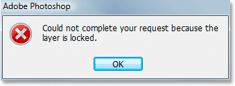 A pop-up message telling me that Photoshop cannot move the Background layer because it is locked.