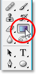 Selecting the Gradient tool from the Tools palette.