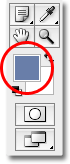Цвет переднего плана образец в палитре Инструменты в Photoshop. Image © 2008 Photoshop Essentials.com.