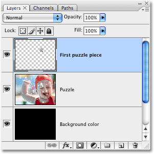 The puzzle piece is now on its own layer. Image © 2008 Photoshop Essentials.com.