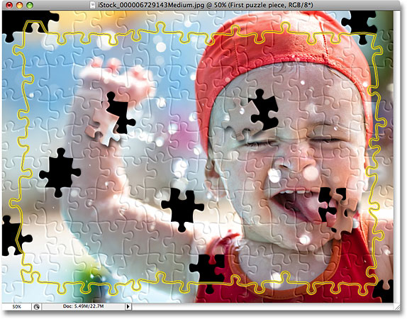 Draw a path around the inside edges of the pieces along the edges of the photo. Image © 2008 Photoshop Essentials.com.