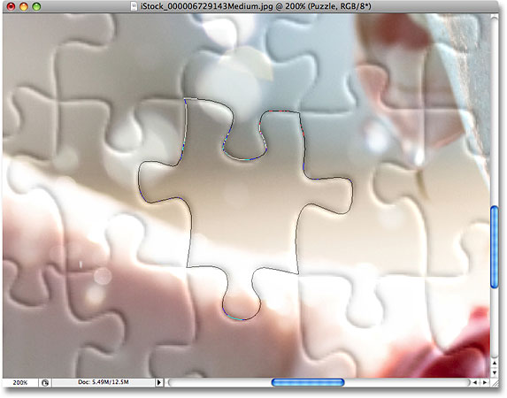 Drawing a path around another puzzle piece. Image © 2008 Photoshop Essentials.com.