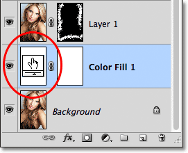 Clicking on the color swatch for the Solid Color fill layer. Image © 2011 Photoshop Essentials.