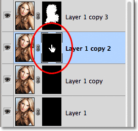 Clicking the mask thumbnail for the second layer. Image © 2011 Photoshop Essentials.