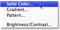 Choosing a Solid Color fill layer in Photoshop. Image © 2011 Photoshop Essentials.