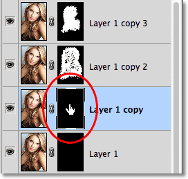 Clicking the mask thumbnail for the third layer. Image © 2011 Photoshop Essentials.
