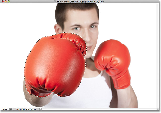 The boxing glove in the photo has been selected. Image © 2011 Photoshop Essentials.com.