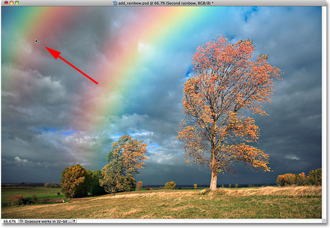 Menyeret pelangi kedua ke tempat dalam dokumen. Image © 2010 Photoshop Essentials.com