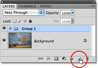 The New Layer icon di panel Layers di Photoshop. Image © 2010 Photoshop Essentials.com