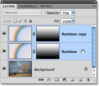 Selecting two layers at once in the Layers panel in Photoshop. Image © 2010 Photoshop Essentials.com