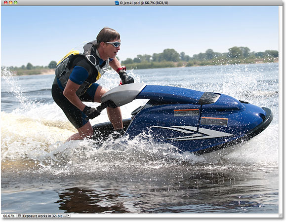 Sebuah jetski balap di atas air. Gambar berlisensi dari iStockphoto oleh Photoshop Essentials.com.