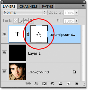 Selecting the layer mask in the Layers panel. Image © 2009 Photoshop Essentials.com.