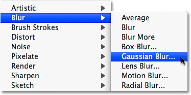 Memilih filter Gaussian di Photoshop. Image � 2009 Photoshop Essentials.com.