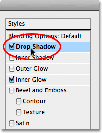 Memilih layer style Drop Shadow di Photoshop. Image © 2009 Photoshop Essentials.com.