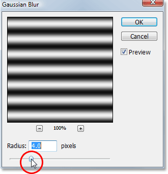 Adjusting the Radius value in the Gaussian Blur dialog box.