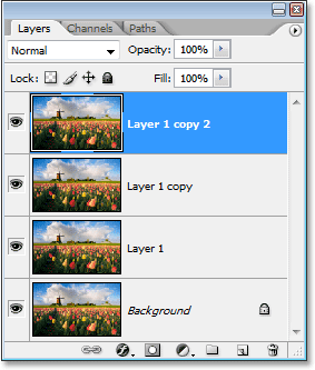 Photoshop's Layers palette now showing the Background layer plus three copies above it.