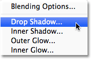 Memilih layer style Drop Shadow. Image © 2012 Photoshop Essentials.com.