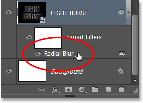 Re-membuka Radial Blur Smart Filter pada panel Layers. Image © 2013 Photoshop Essentials.com