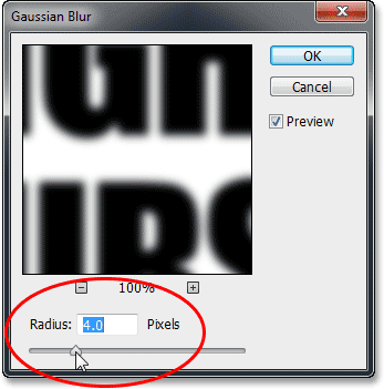 Setting the Radius value in the Gaussian Blur dialog box. Image © 2013 Photoshop Essentials.com