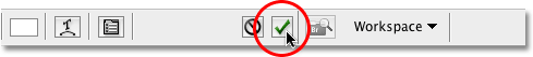 Clicking the checkmark in the Options Bar. Image © 2009 Photoshop Essentials.com.