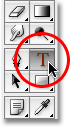 Selecting the Type Tool in Photoshop. Image © 2009 Photoshop Essentials.com.