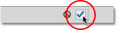 Clicking the checkmark to accept the text. Image © 2010 Photoshop Essentials.com.