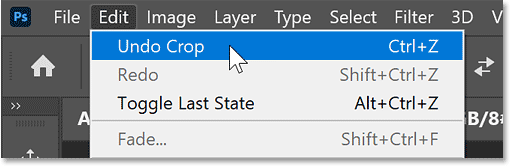 Choosing the Undo Crop command in Photoshop.