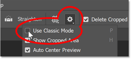 Turning off Classic Mode for the Crop Tool in Photoshop's Options Bar.