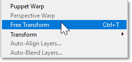 Choosing the Free Transform command from the Edit menu in Photoshop