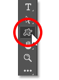 Selecting the Custom Shape Tool from Photoshop's toolbar