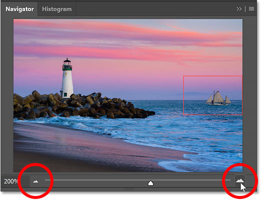 The zoom in and zoom out icons in the Navigator panel in Photoshop.