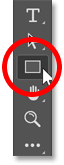 Selecting the Rectangle Tool in Photoshop's toolbar