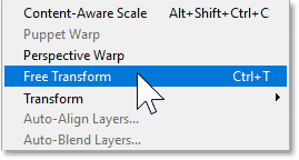 Selecting Photoshop's Free Transform command from the Edit menu.