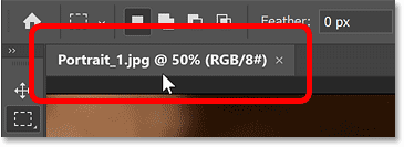 The document information appears brighter in the tab for the active image in Photoshop.